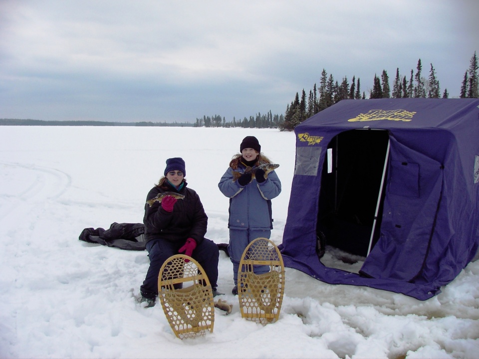 father and son ice fishing