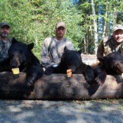 Hunters showing their kills