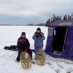 father and son ice fishing